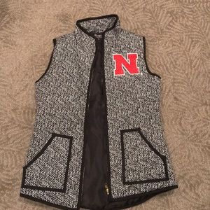 Husker vest
